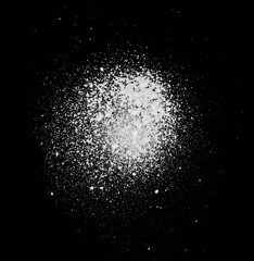 Realistic grunge graffiti spray paint effect on the black background. Isolated white ink texture.