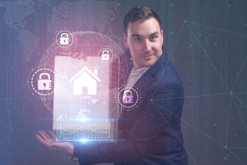 The concept of business, technology, the Internet and the network. A young entrepreneur working on...