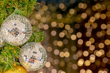 Glass ball ornaments on a Christmas tree and blurred lights. with clipping path.