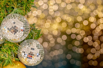 Glass ball ornaments on a Christmas tree and blurred lights. with clipping path.