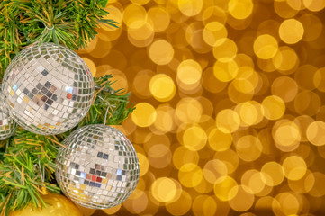Glass ball ornaments on a Christmas tree and blurred lights. with clipping path.