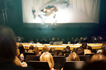 people at the theater