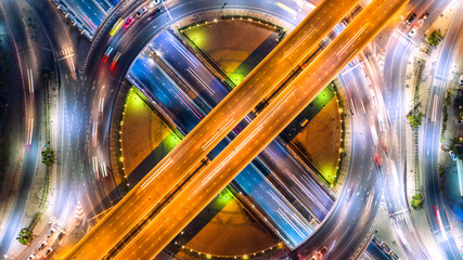 Aerial view and top view of traffic on city streets in bangkok , thailand. Expressway with car lots.