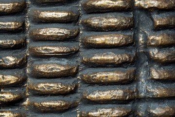 Metal casting in the form of convex sections.