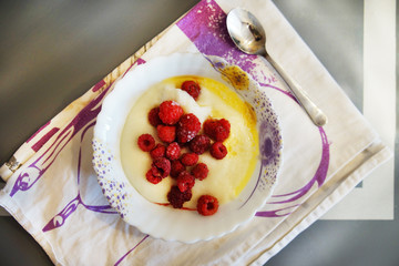 semolina porridge with raspberry. 