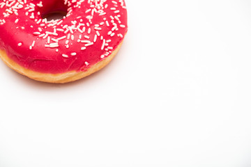 pink donut on a white background and space for text