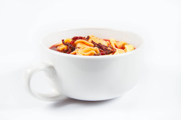 Traditional polish Christmas Eve dish: red borscht with uszka (a mushroom filled kind of dumplings)