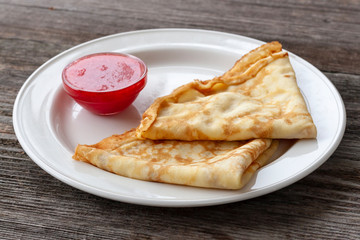 Vegetarian breakfast: wheat pancakes with strawberry jam