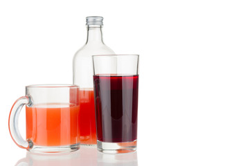 Bottle and glasses with fresh juice isolated on white background