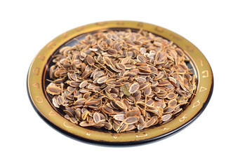 Stack of Dill seeds isolated on white background