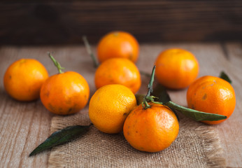 Fresh spelled clementine tangerines with leaves