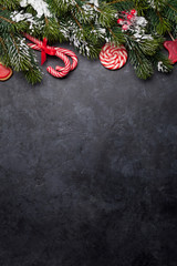 Christmas card with sweets and fir tree