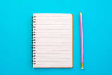 Notebook and equipment back to school on color background.