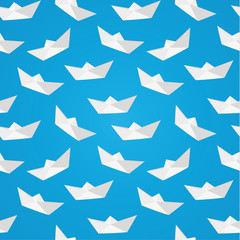 White paper origami boat seamless pattern on a blue background