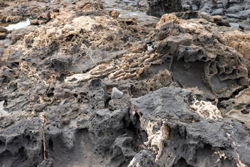 Closeup of volcanic lava stones on beach in Fuerteventura. Canary Islands