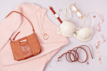 Woman clothing and accessories in pastel colors.