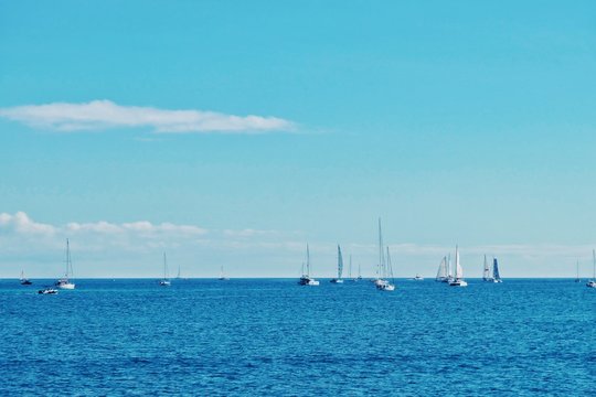 sailing boats are leaving the city marina for the atlantic crossing regatta race ARC 2018 on a sunny day