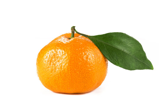 Tangerine with leaf on a white background  