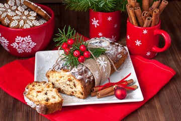 Stollen, traditional Christmas cake with dried fruits and nuts. Christmas holiday food

