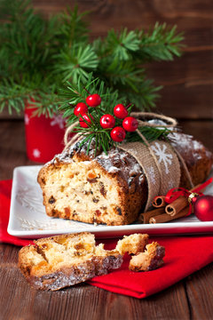 Stollen, traditional Christmas cake with dried fruits and nuts. Christmas holiday food
