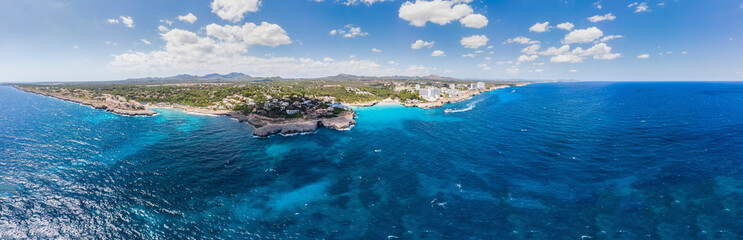 Fototapeta premium Aerial view, coast with hotels and villas, Cala Tropicana and Cala Domingos, Porto Colom region, Mallorca, Balearic Islands, Spain