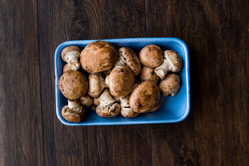 Portobello Raw Cremini Mushrooms in Plastic Container Package or Box.