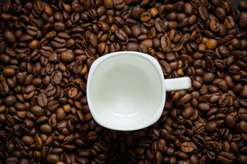 coffee beans (good and bad grain) - arabica and robusta blend (roasted coffee grain). Black background. Top view . Copy space.