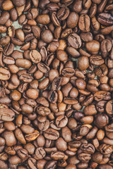 coffee beans (good and bad grain) - arabica and robusta blend (roasted coffee grain). Black background. Top view . Copy space.
