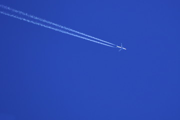 A plane of international airlines in the clear sky