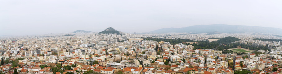 Naklejka premium Panoramiczny widok na dachy i domy w Atenach, Grecja.