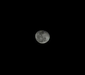 Full moon that has a black background. The Moon's orbit around the Earth.