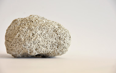 Pumice stone on white background 