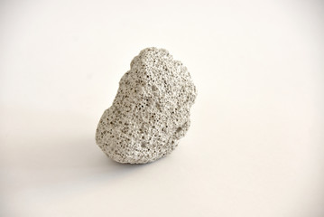 Pumice stone on white background 