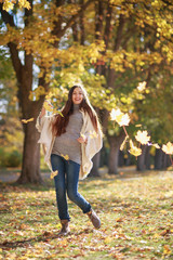 beautiful woman in autumn park