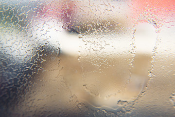 Winter background, frozen glass from strong frost, ice texture on the window