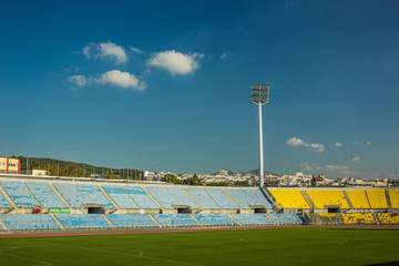 empty football stadium complex and led light projector in summer bright day time clear weather 