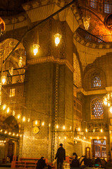 Fototapeta na wymiar Eminönü, Istanbul / Turkey - 02 07 2014: Yeni Cami (New Mosque) interior.