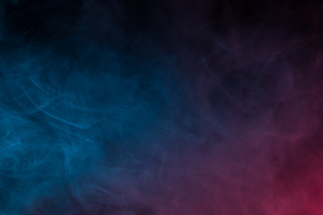 Colorful smoke close-up on a black background
