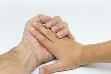 Father's and Son's hands on white Background
