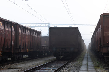 Fototapeta na wymiar Old train wagons parked in a train station