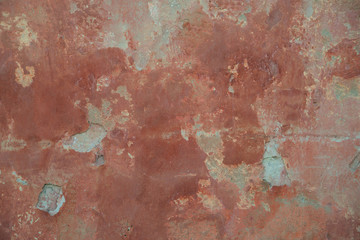 background texture old red wall. peeling paint