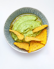 Guacamole and nachos, top view