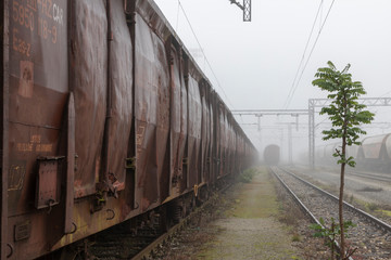 Fototapeta premium Old train wagons parked in a train station