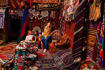 Woman in the Turkish carpet market