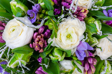 Elite bouquet of beautiful luxury flowers with twigs in hoarfrost style, close-up