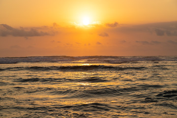 Fototapeta na wymiar Blue Point (Suluban beach) sunset scenery. Famous surfers place in Bali, Indonesia