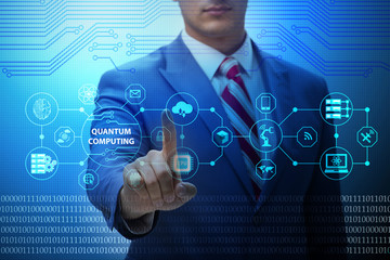 Businessman pressing virtual button in quantum computing concept