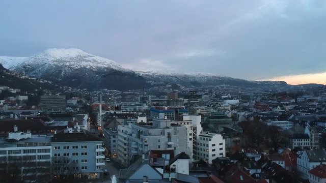 aerial view of winter mountain city covered in snow Bergen Norway