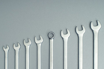 A set of hand wrenches. Stand out, don't be like everyone else. Men's theme.