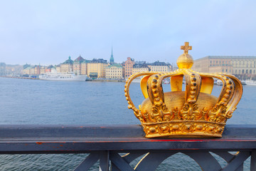 Royal crown and Stockholm cityscape at winter morning, Sweden